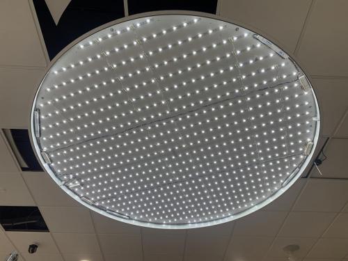 round ceiling picture illuminated by LEDs